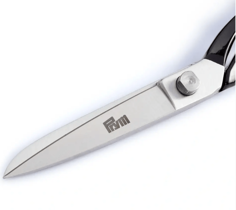 Black steel tailor's scissors with a Prym logo.