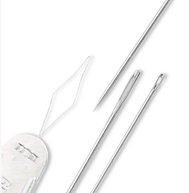 Assortment of 19 steel sewing and darning needles with a threader.