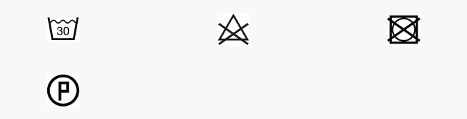 Black crescent-shaped shoulder pads with care instructions.