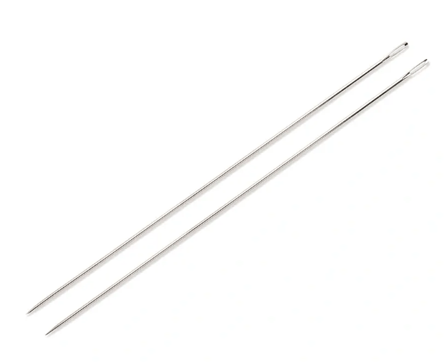 Two silver-colored steel mattress needles with eyes.