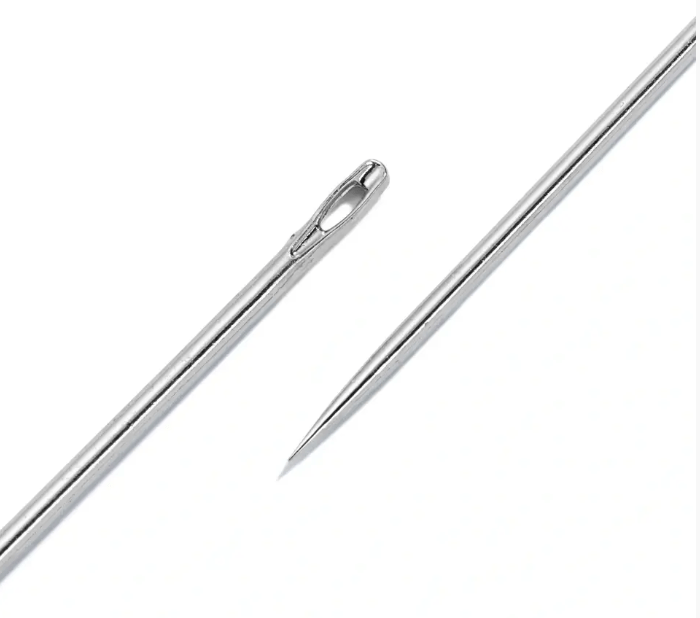 Two steel sewing needles, one with an eye and one with a pointed tip.