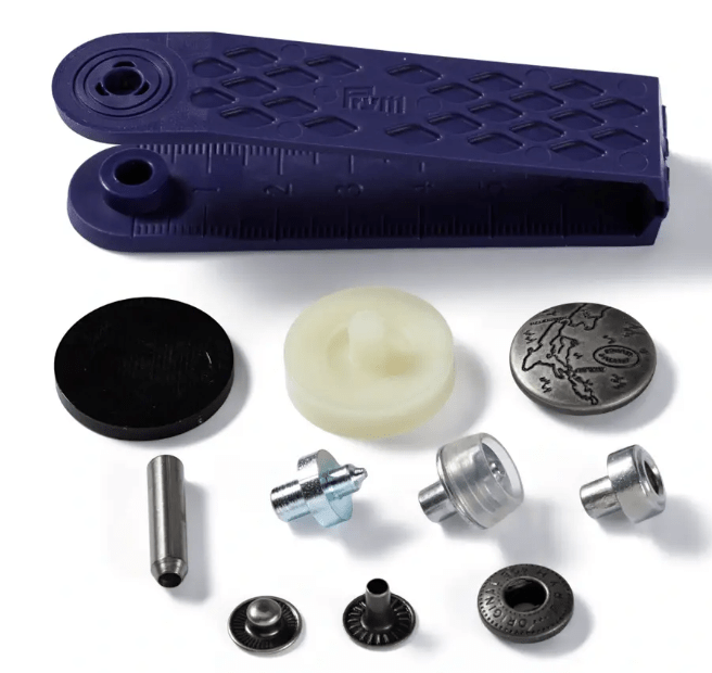 Silver matt brass anorak design non-sew press fasteners with tools.