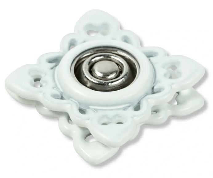 White square sew-on snap fasteners with decorative trim and metal center.