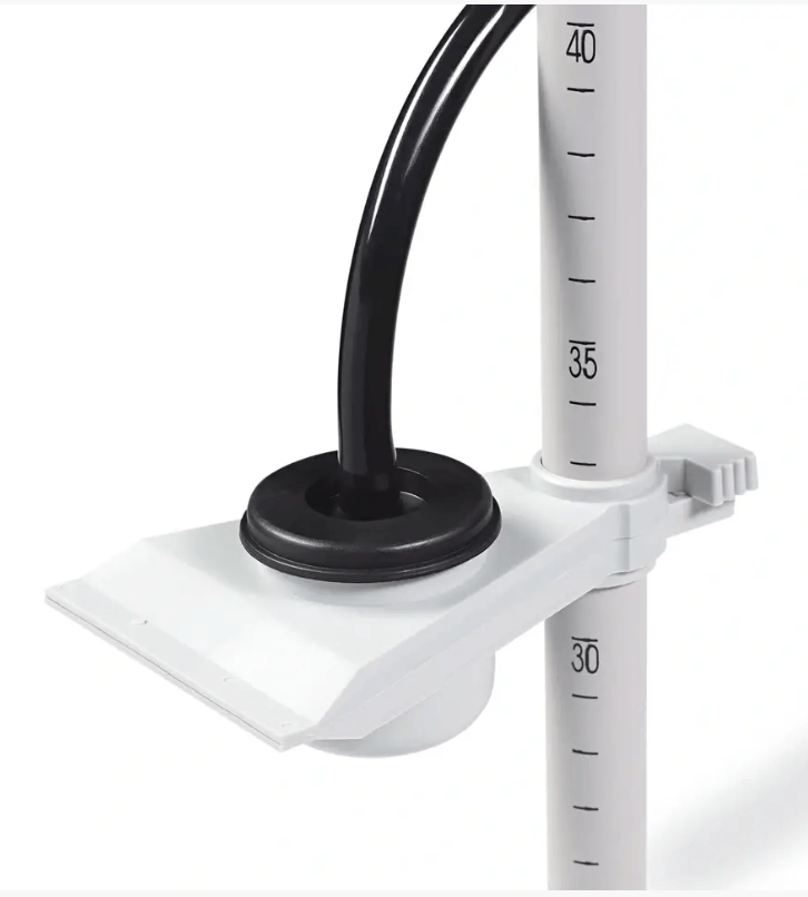 A grey plastic skirt marker with an 80cm scale and a black tube.