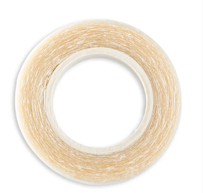 Transparent double-sided adhesive tape on a roll.