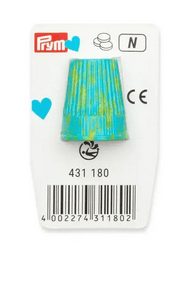 Prym Love thimble in mint green with yellow speckles.