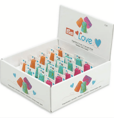 Prym Love thimbles in assorted colors and sizes in a display box.