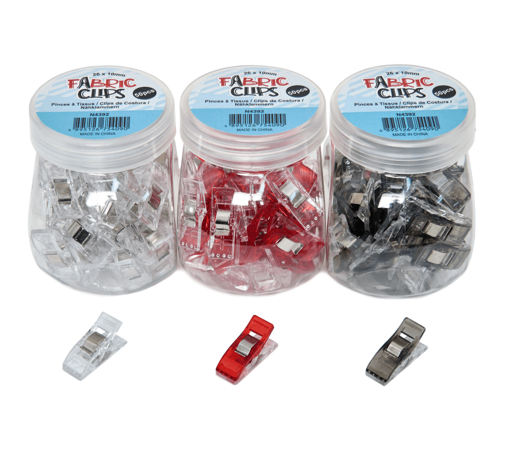 Three jars of fabric clips in red, black, and clear, with individual clips shown below.