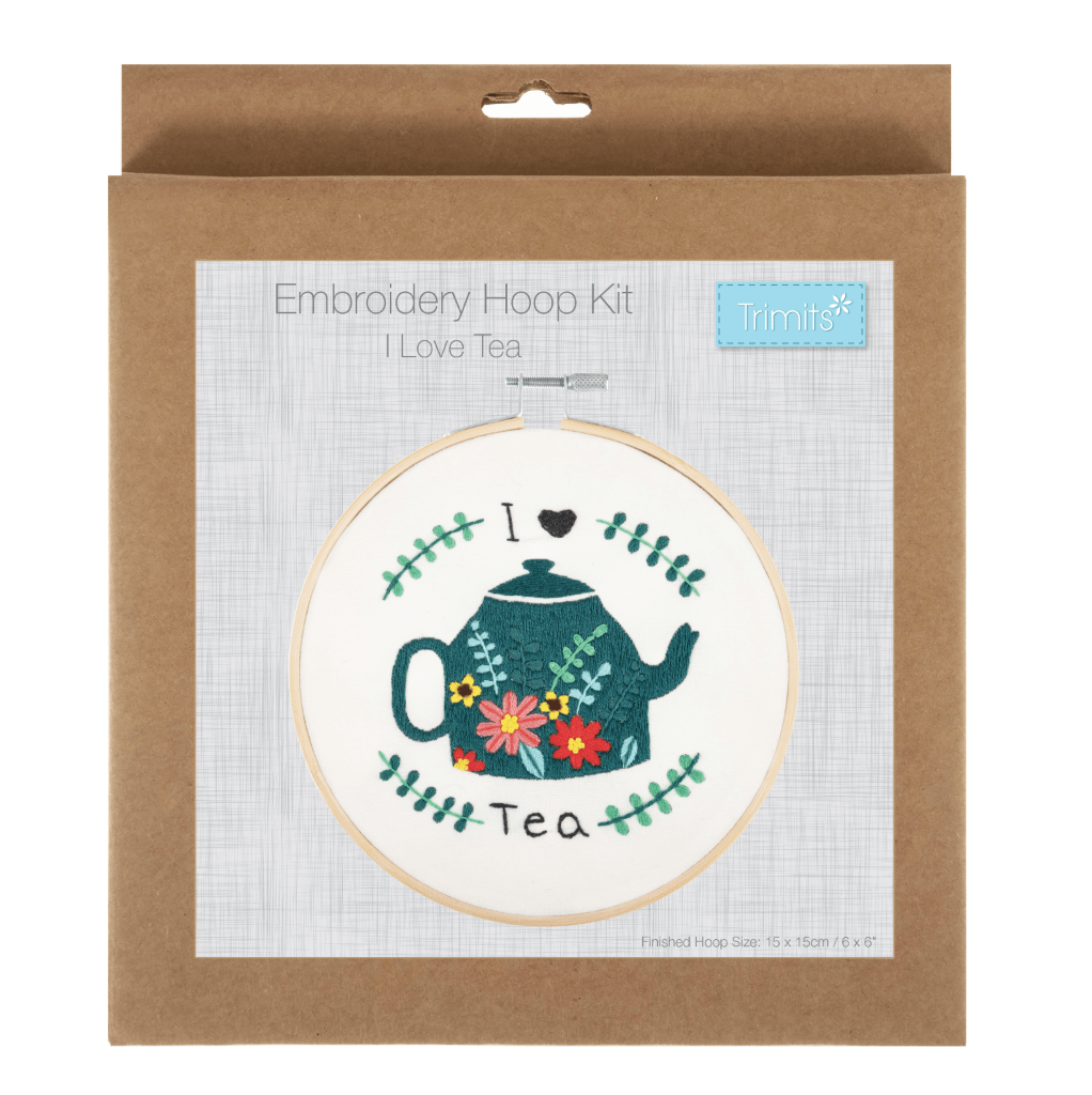 Embroidery hoop kit with a "I Love Tea" design featuring a teapot and flowers.