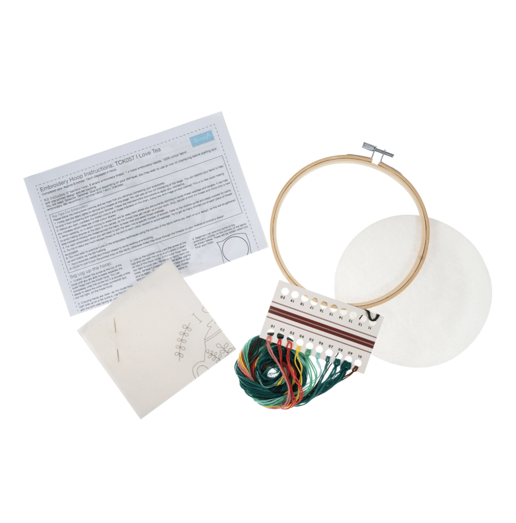 Embroidery kit with bamboo hoop, threads, needle, fabric, and instructions.