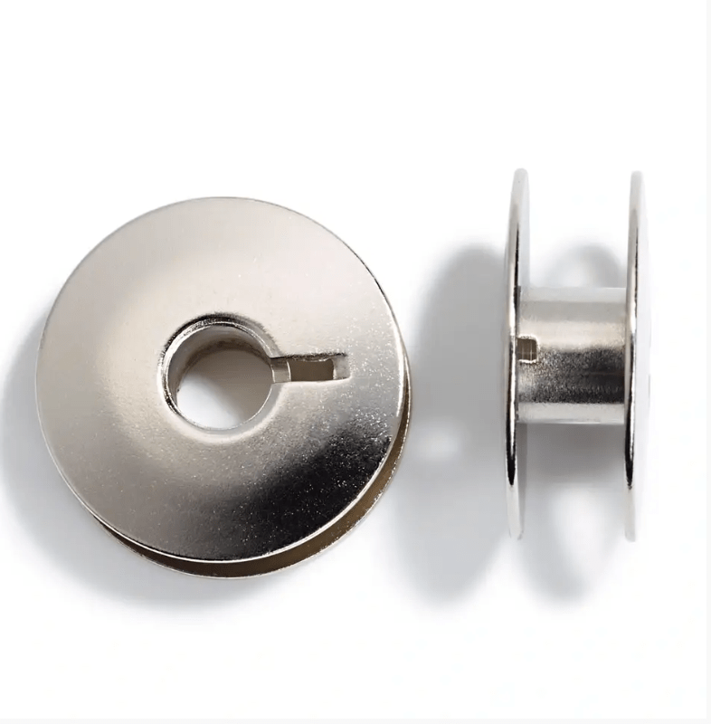Sewing machine bobbins, steel, double rotary gripper, 21.9mm - Galedi Pins