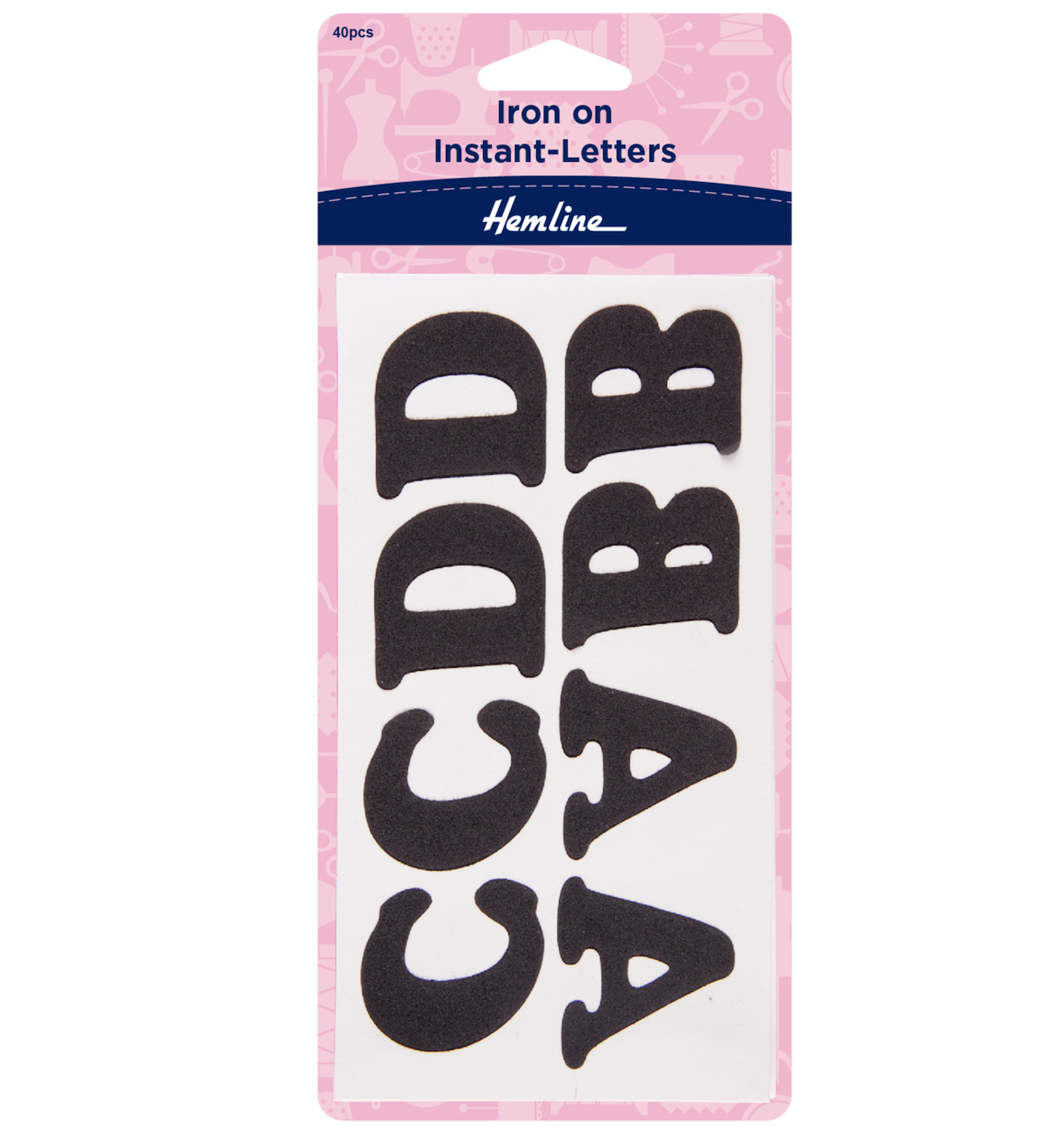 Black fabric iron-on letters spelling CCD and AABB on a pink and white package.