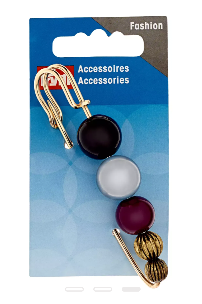 Prym decorative safety pin with five assorted beads in black, silver, red, and gold.