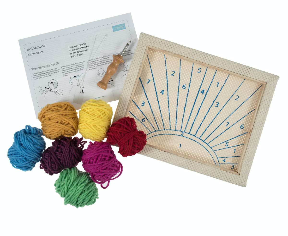 Punch Needle Kit: Sunrays with pre-printed canvas, punch needle tool, yarn, and instructions.