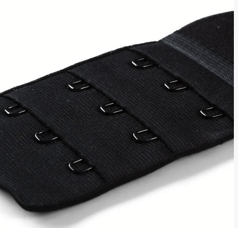 Black bra extender with three rows of three hooks.