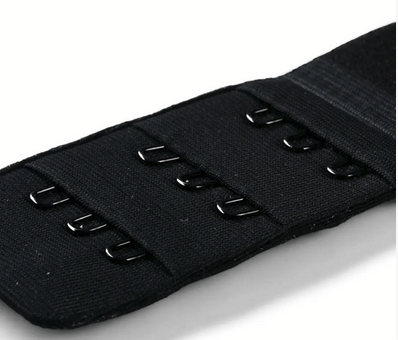 Black bra extender with three rows of three hooks.