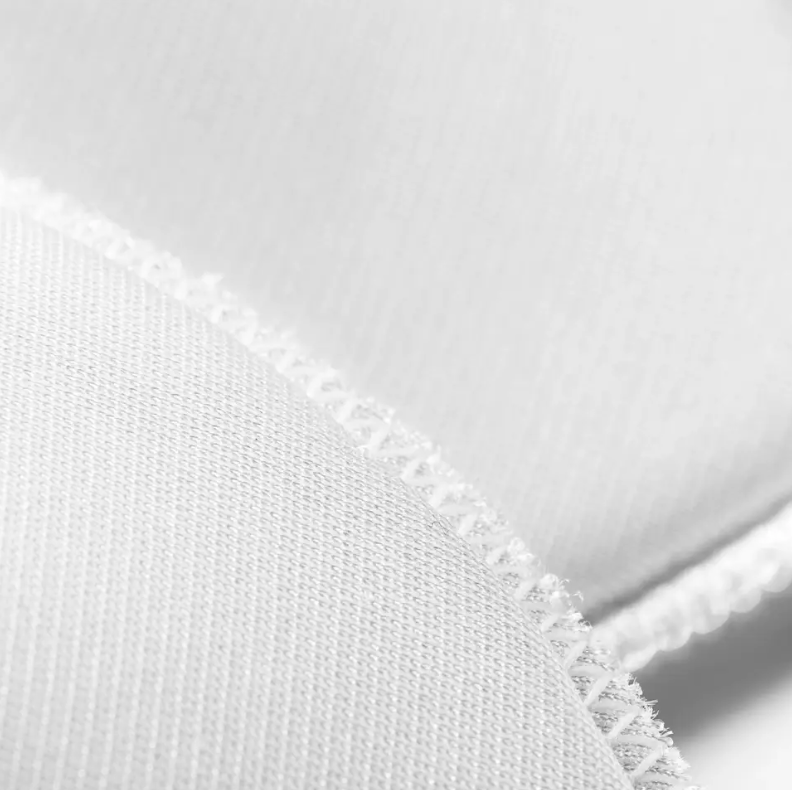 White polyamide bra pads with a soft cover for shaping and stabilization.