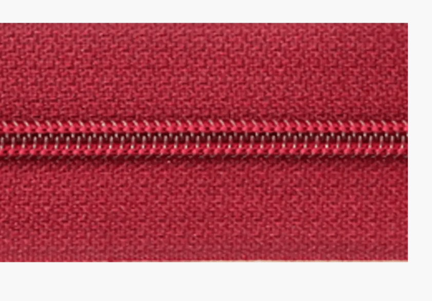 Red polyester zipper with silver teeth.