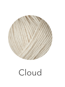 A ball of light beige heavy merino wool yarn.