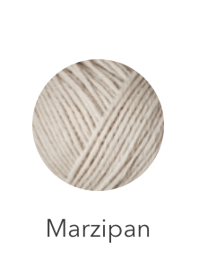 A ball of marzipan colored heavy merino wool yarn.