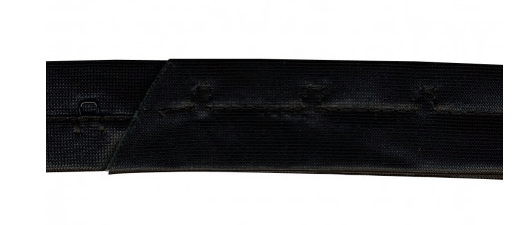 Black hooked ribbon with brass and polyamide mix.