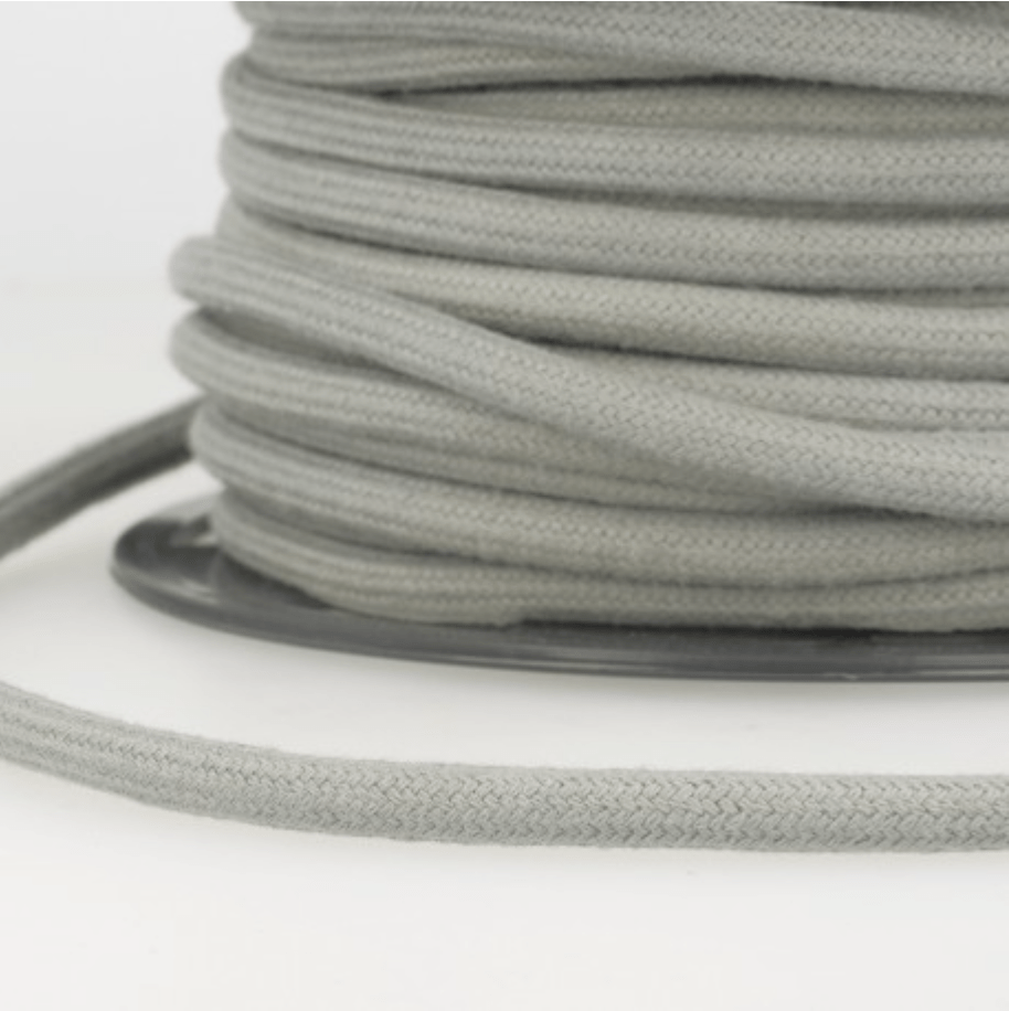 A spool of grey 4mm 100% cotton craft cord.