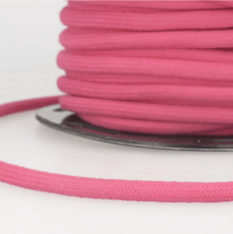 A spool of pink 4mm 100% cotton craft cord.