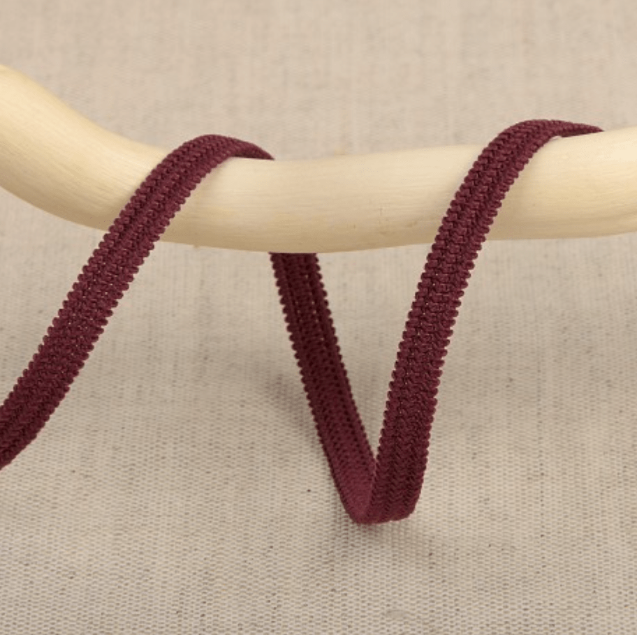 Stephanoise 5mm wide burgundy elastic ribbon made of latex and polyester.