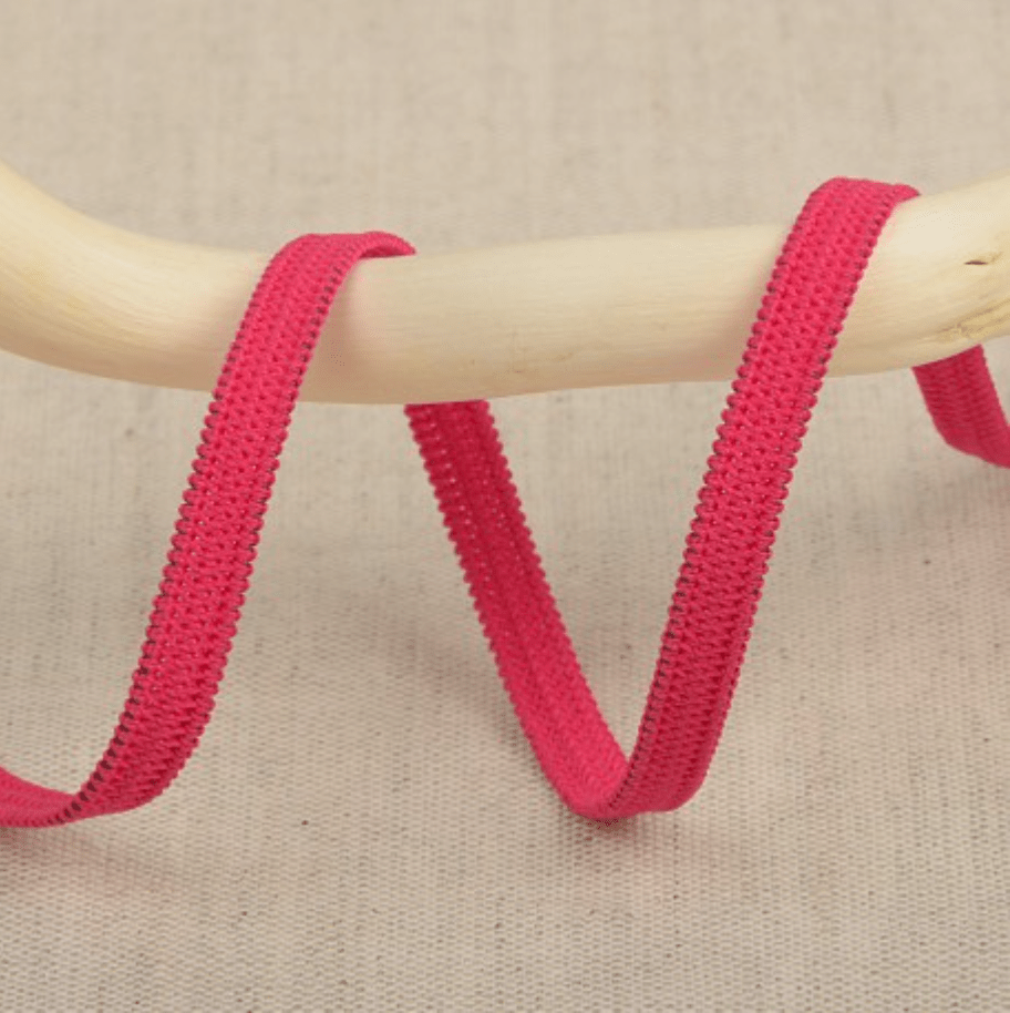 Stephanoise 5mm wide pink elastic ribbon with a textured edge.
