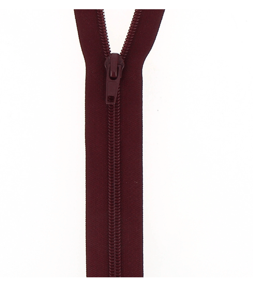 Maroon nylon open-end coil zipper with a dark slider.