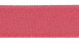 Red double-faced satin ribbon on a roll.