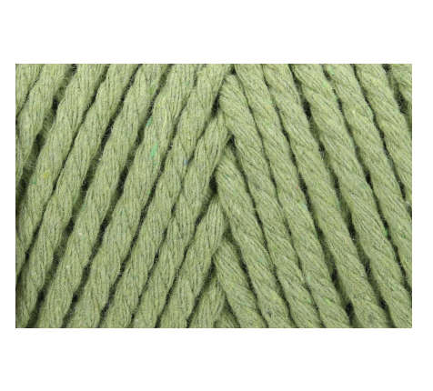 A close-up of light green twisted yarn with flecks of color.