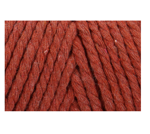 A close-up of rust-colored, twisted yarn.