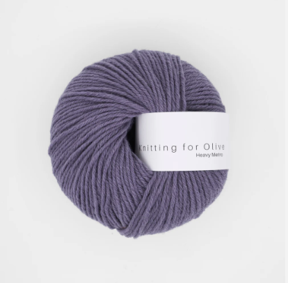 A ball of purple Heavy Merino wool yarn from Knitting for Olive.