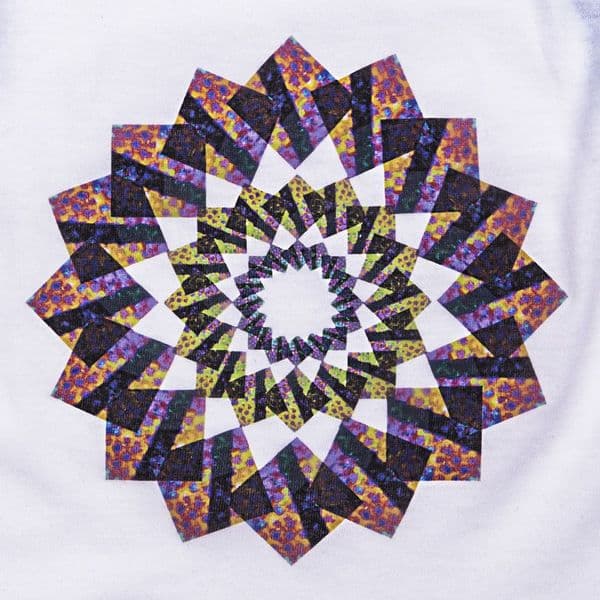 A colorful starburst pattern made with heat transfer paper.