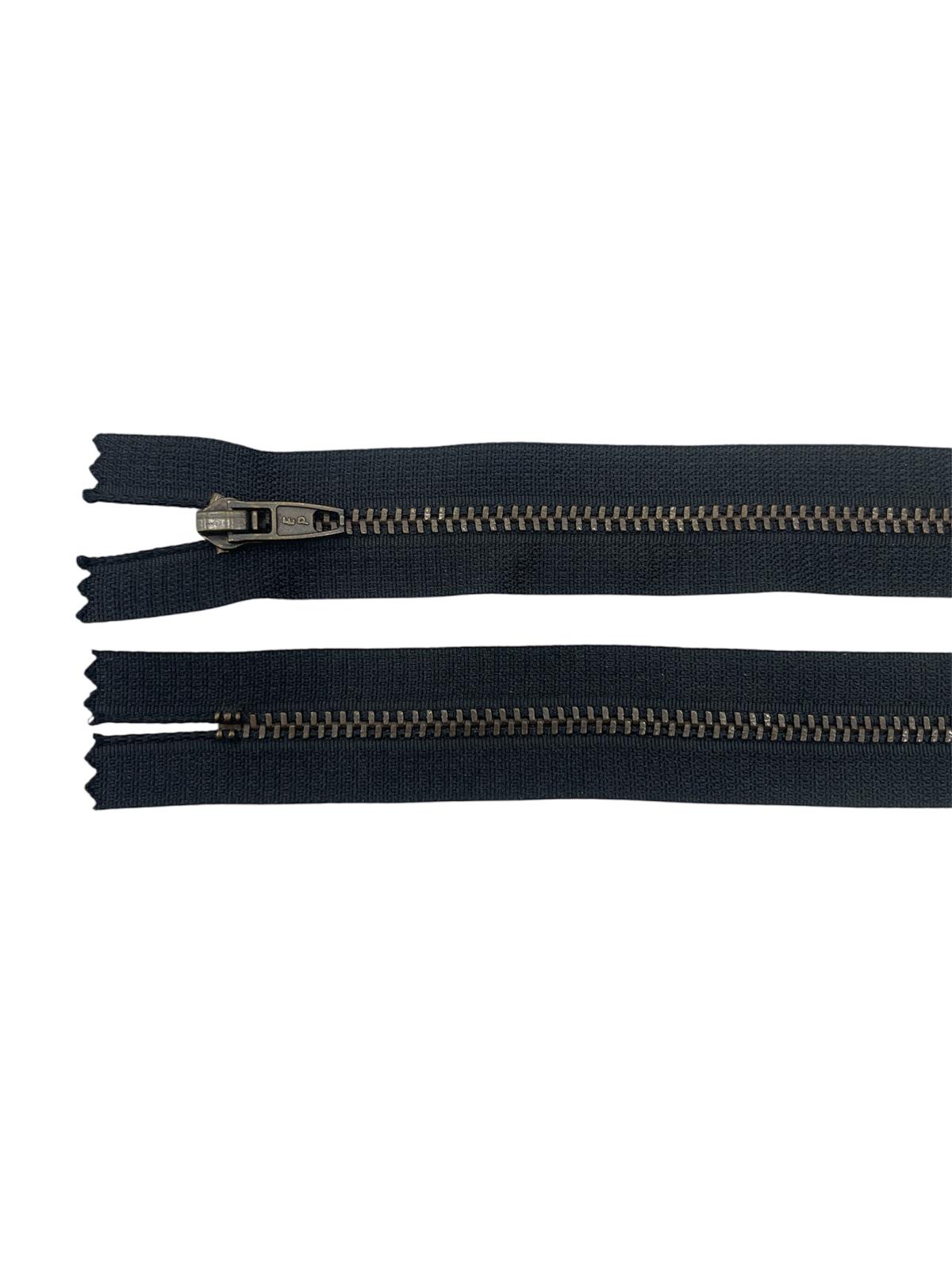 A YKK size 3 brass metal closed-end black zipper shown in two views against a white background.