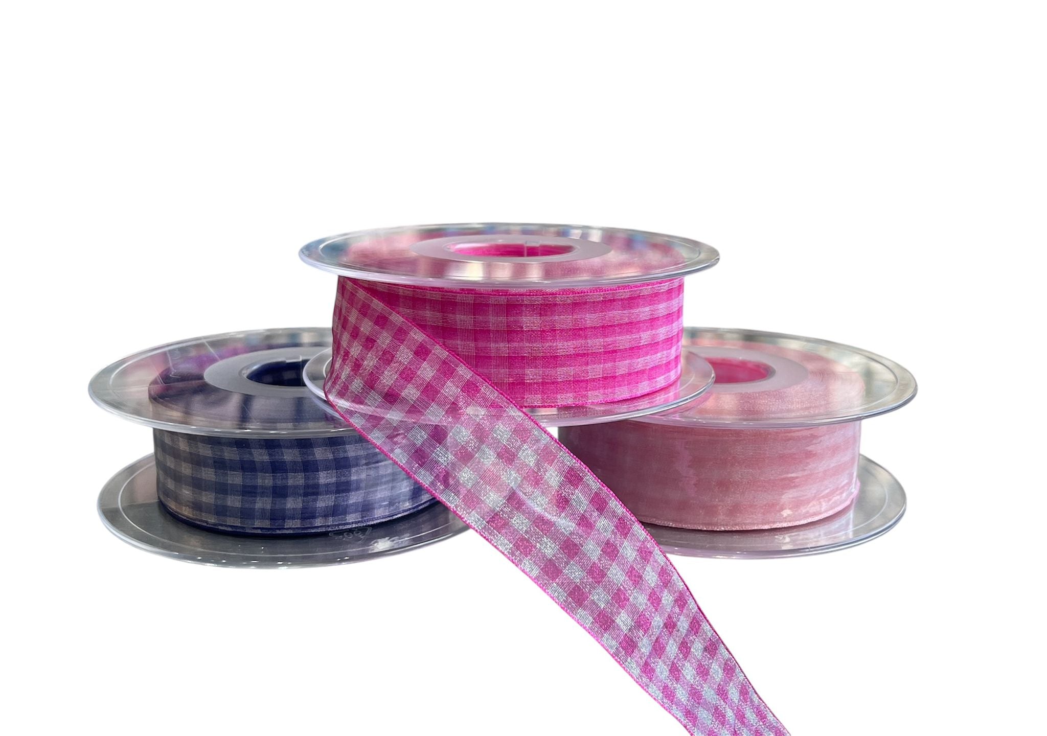 Three rolls of checkered sheer nylon ribbon in navy, bright pink, and light pink.