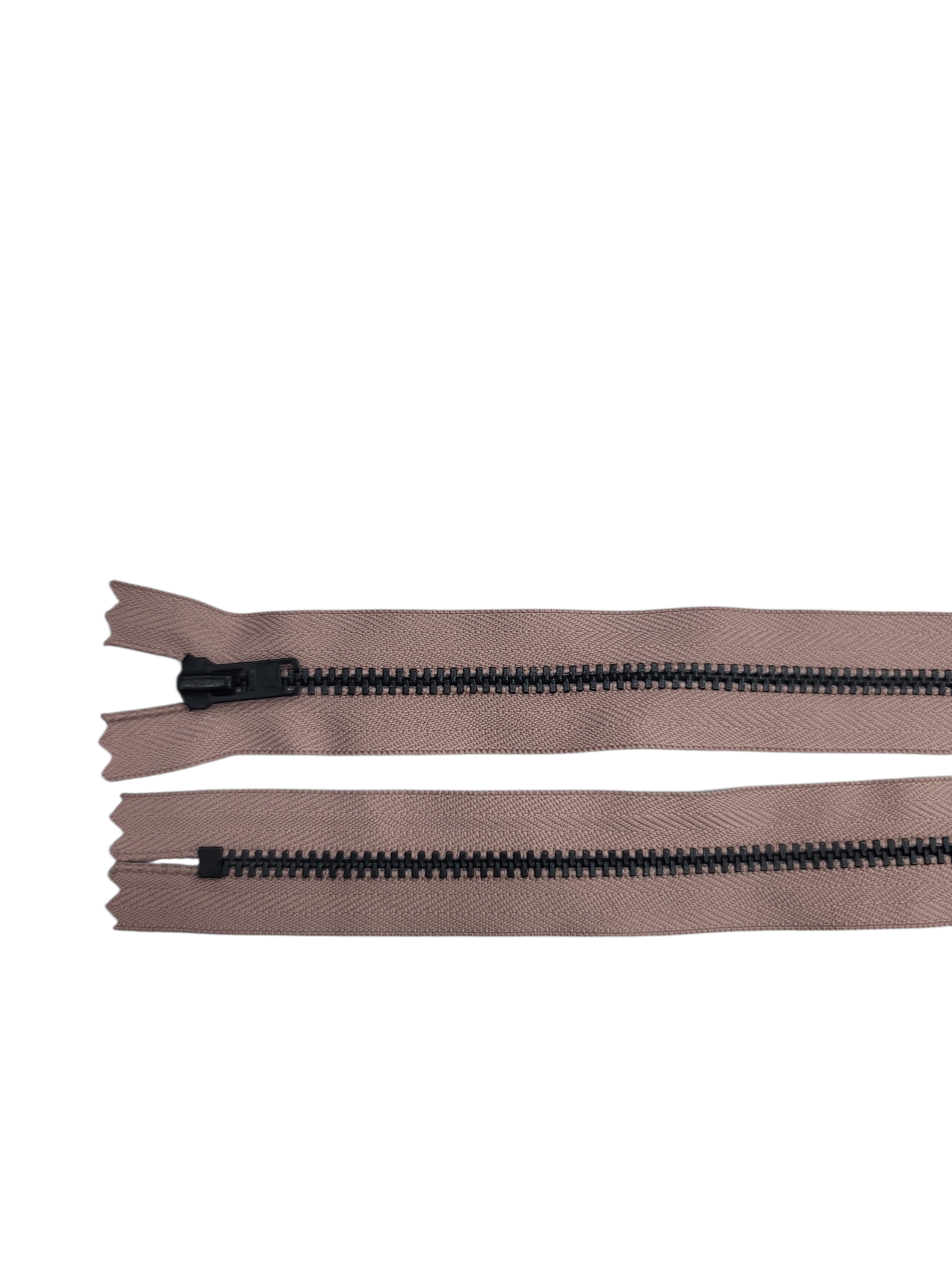 Two closed-end YKK size 3 black metal zippers on a white background.