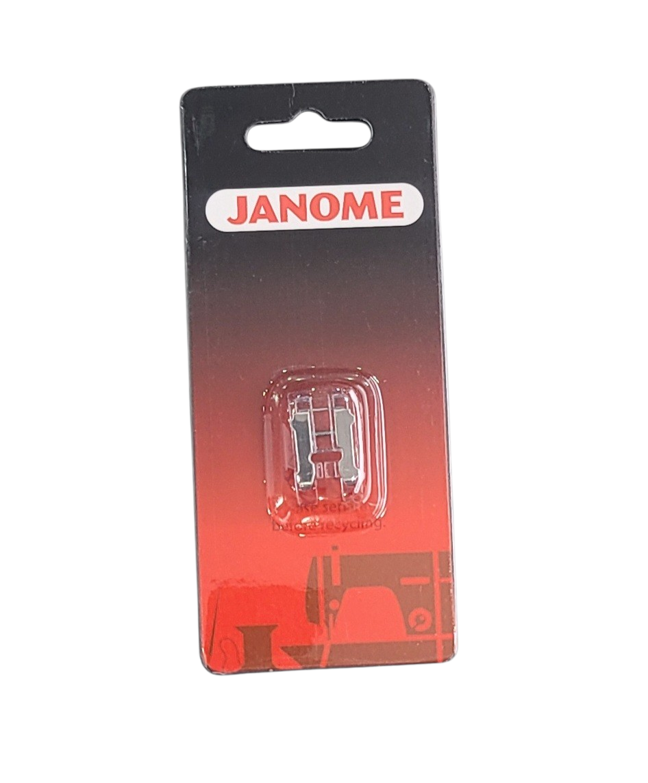 Janome buttonhole foot for long buttonholes and cuffs in its original red and black packaging.