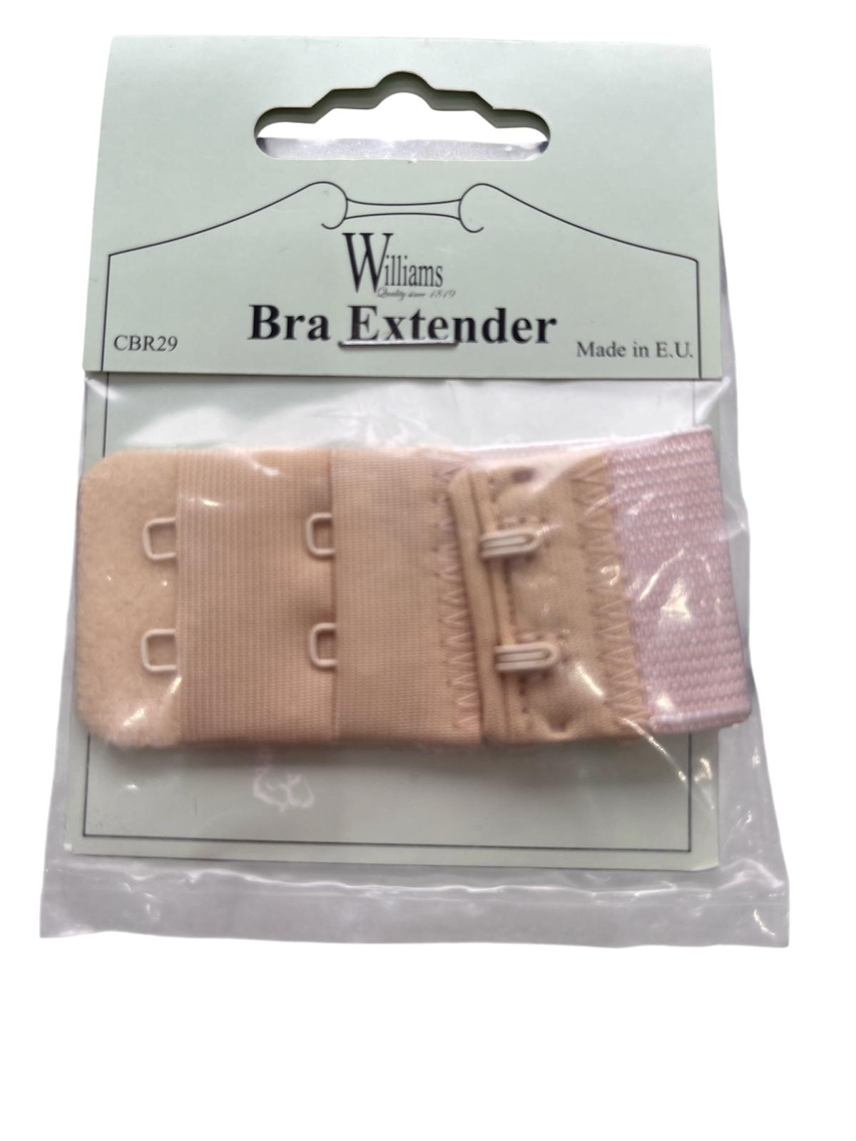 Williams nude elastic bra extender with two rows of hooks in its original packaging.