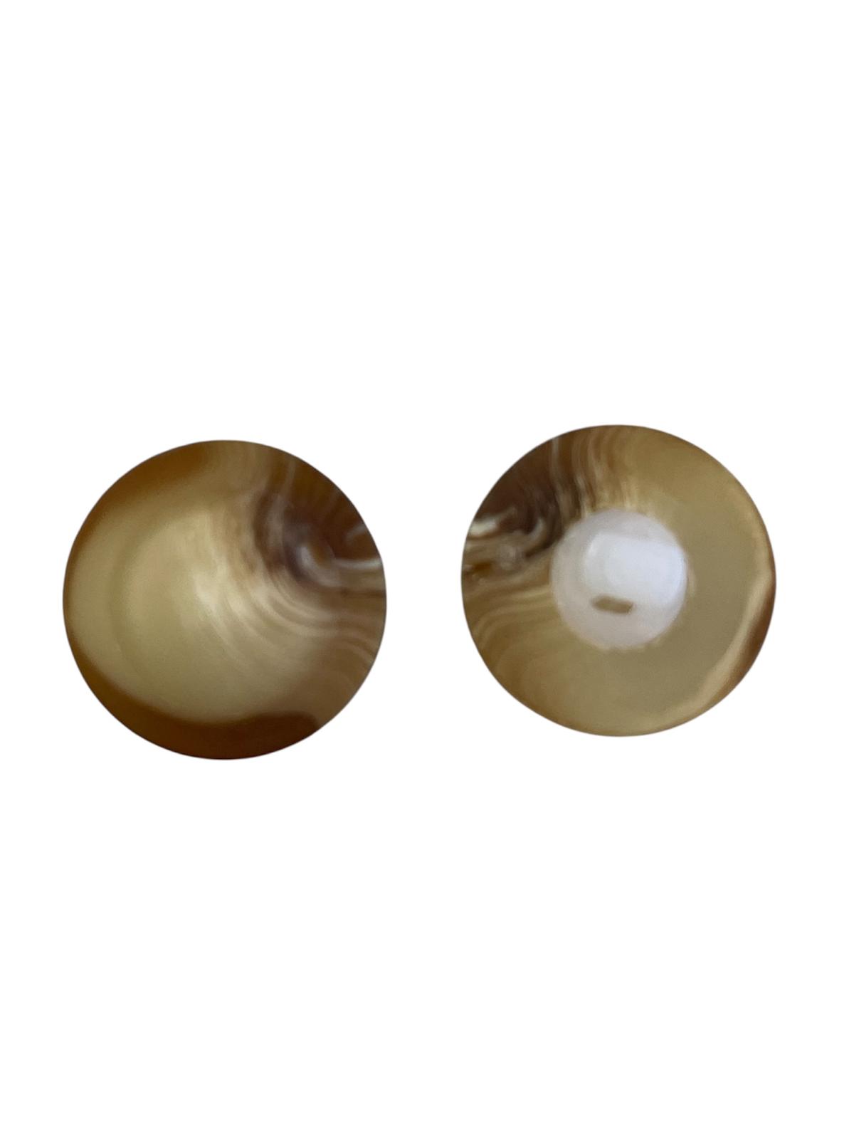 A pair of 20mm polyester shank buttons featuring a marbled brown and tan swirl pattern.
