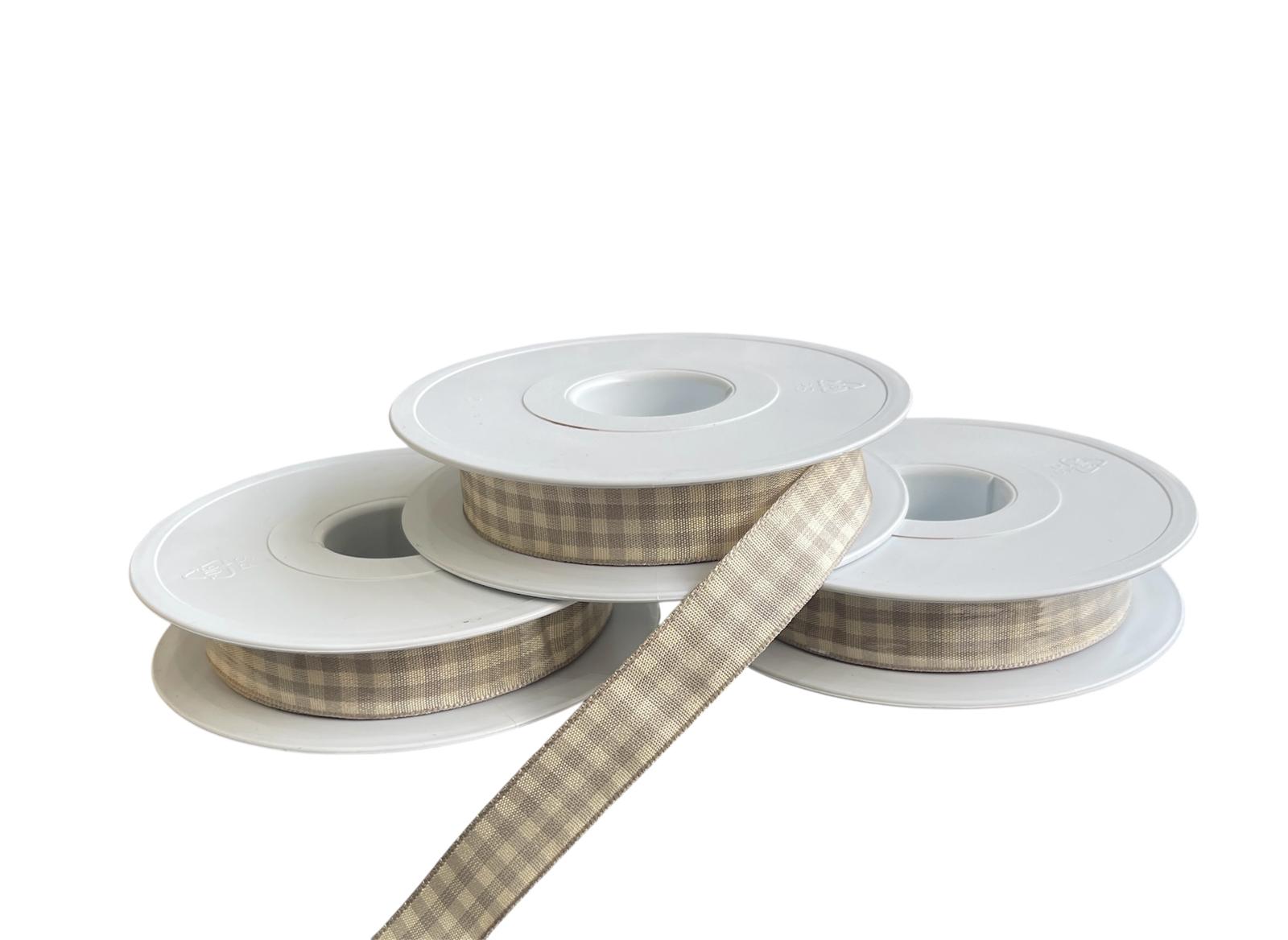 Three rolls of 15mm brown and cream checkered polyester ribbon on white spools.
