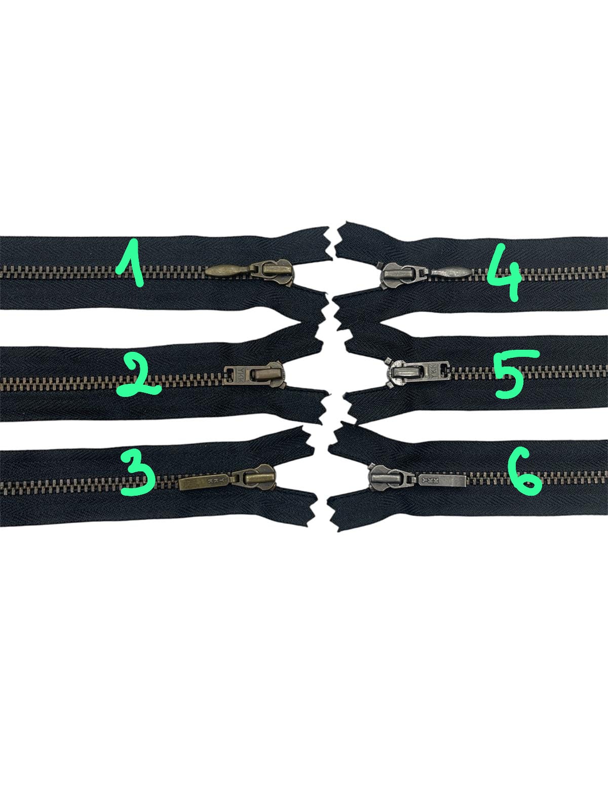 Six YKK size 3 brass metal closed-end black zippers with various slider styles numbered 1 to 6.
