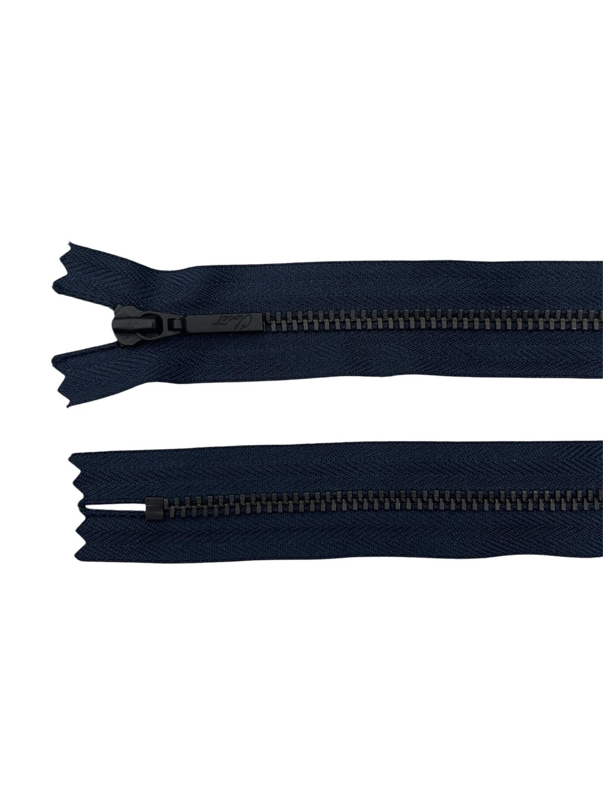 YKK black metal closed-end zipper with visible teeth and slider.