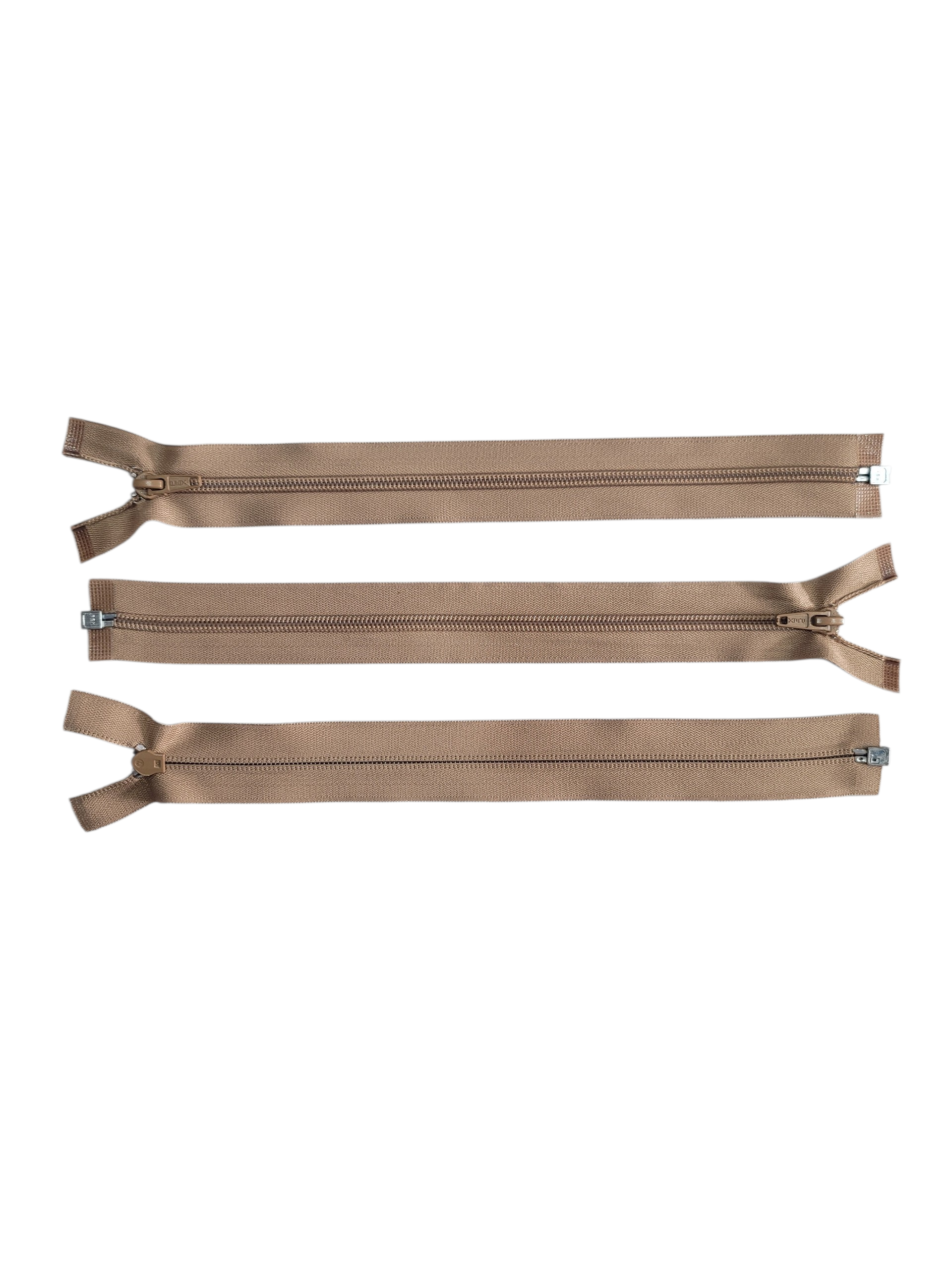 Three heavy-duty fawn-colored plastic open-end zippers shown from different angles.