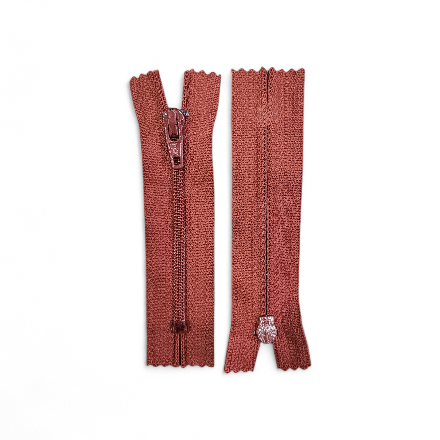 YKK 8cm closed end plastic zipper in grey.