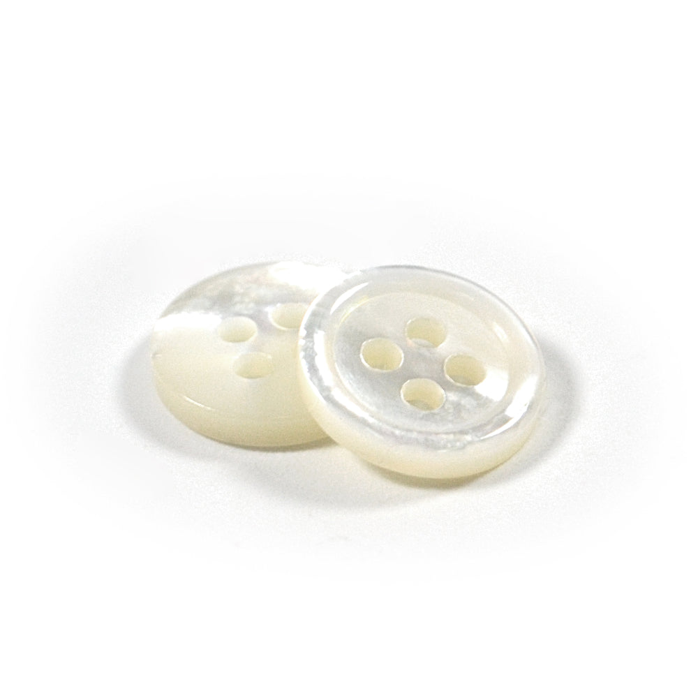 Two small, round white mother of pearl buttons with four holes and an iridescent finish.