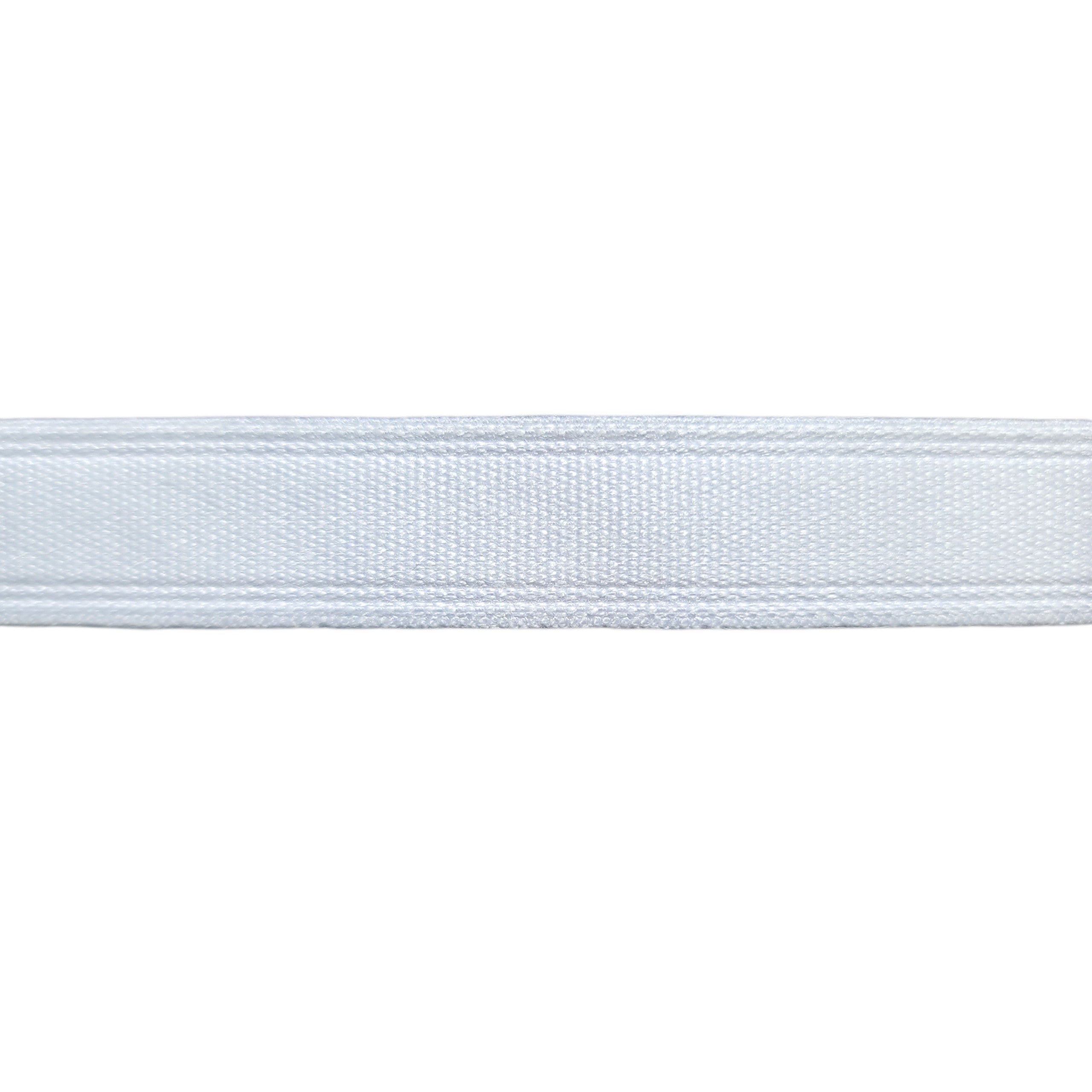 Close-up of white tunnel tape casing for corset boning against a white background.