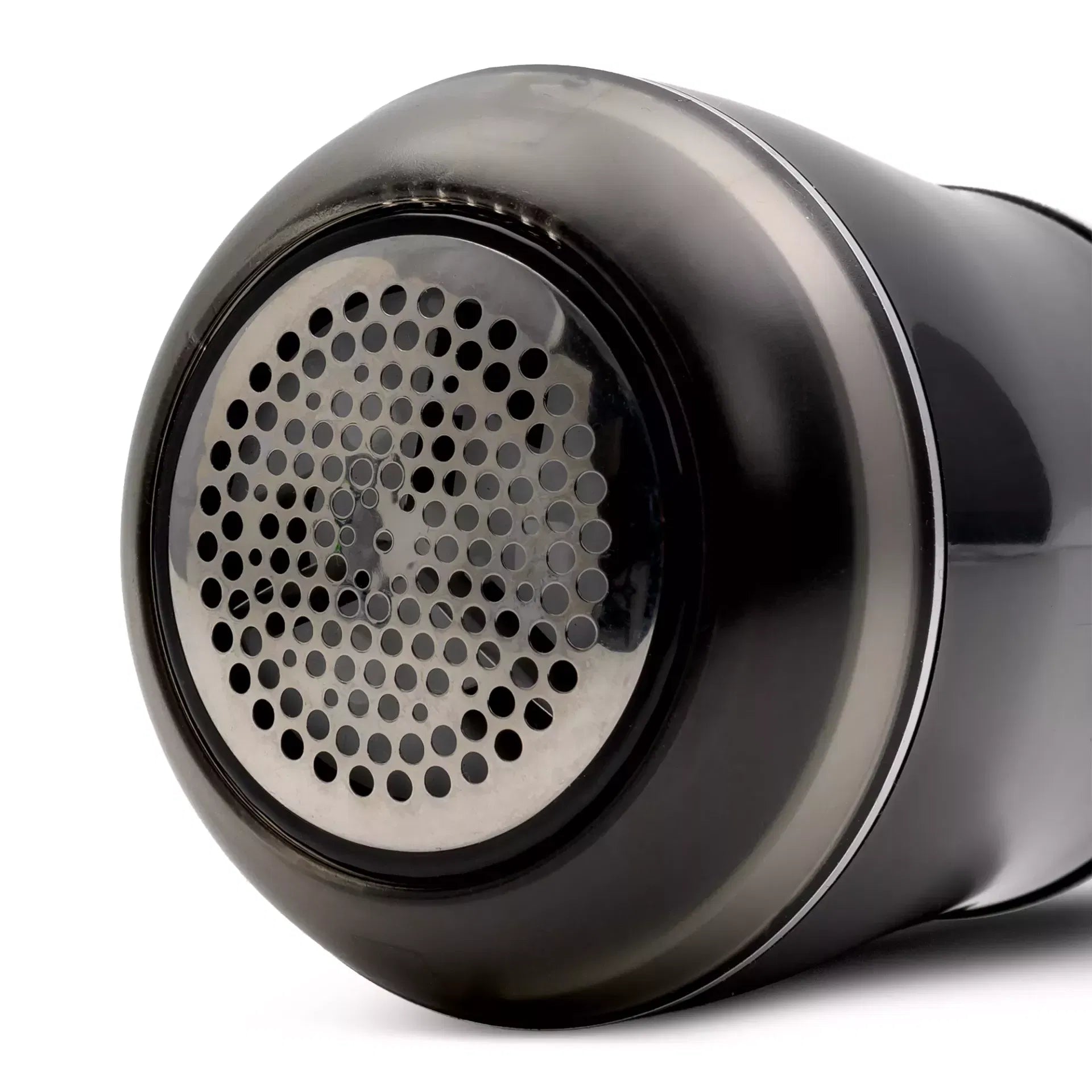 Close-up of the black Prym Lint Shaver PURE showing its circular metal shaving head and mesh cover.