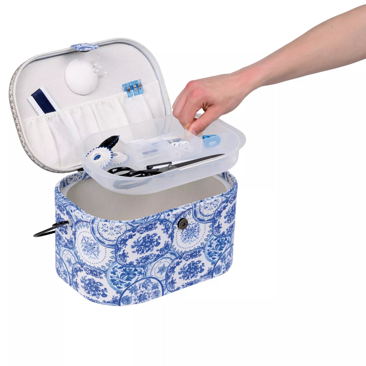 Large oval sewing basket in Delft Blue pattern with removable plastic tray and lid storage.